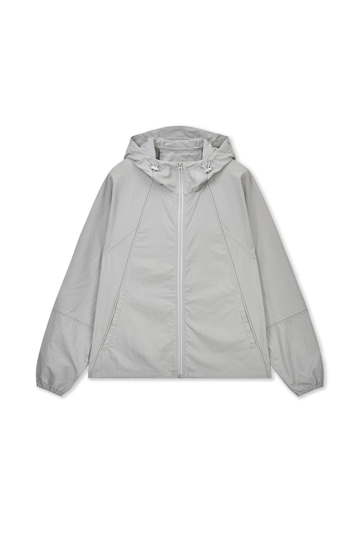 BACK LOGO HOODY WIND BREAKER IN LIGHT BEIGE