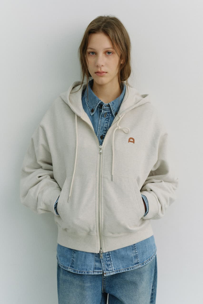 UNISEX LEATHER LOGO ZIP-UP HOODIE OATMEAL MELANGE_UDTS6A108I1