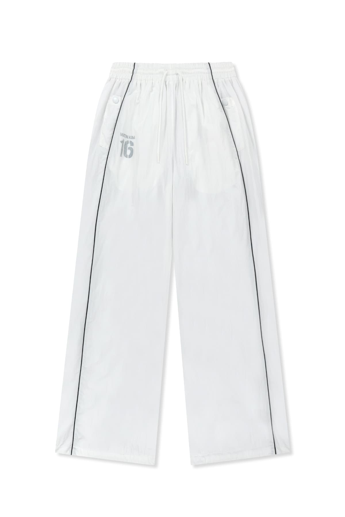 MATIN 16 LOGO TRACK PANTS IN WHITE