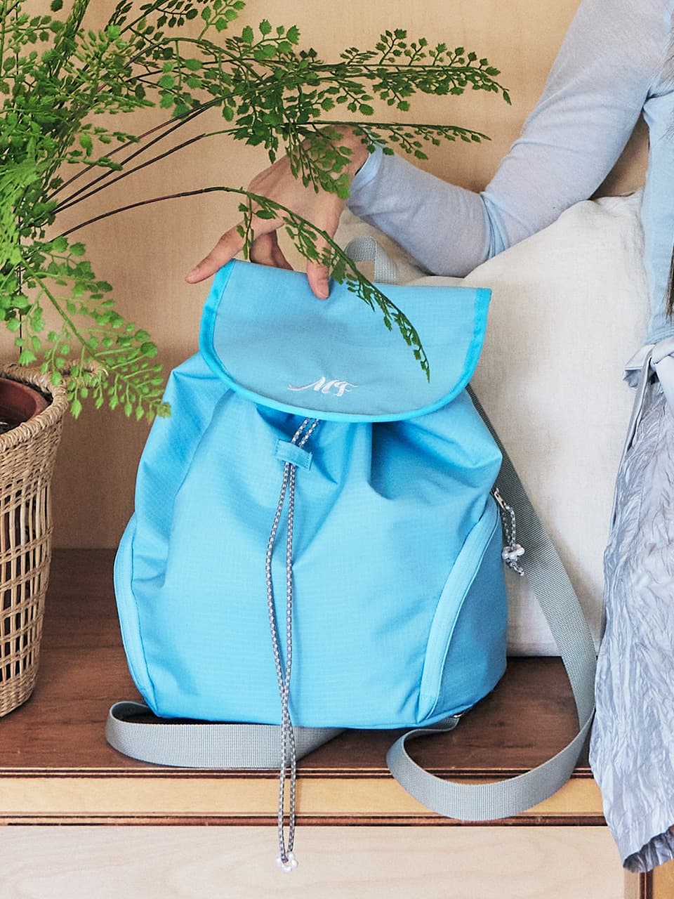SIDE POCKET BACKPACK (LIGHT BLUE)
